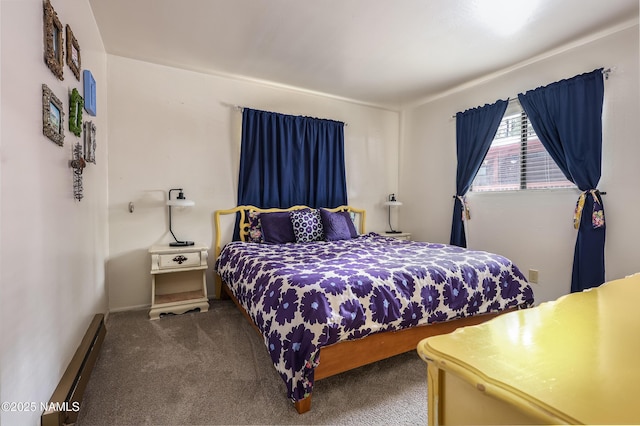 bedroom with a baseboard radiator and carpet