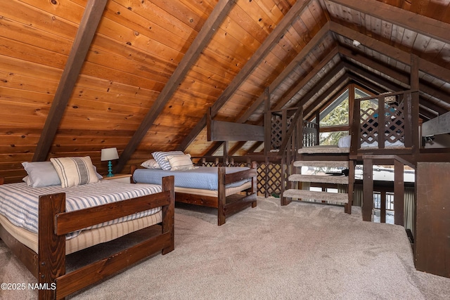 bedroom with lofted ceiling with beams, carpet floors, and wood ceiling