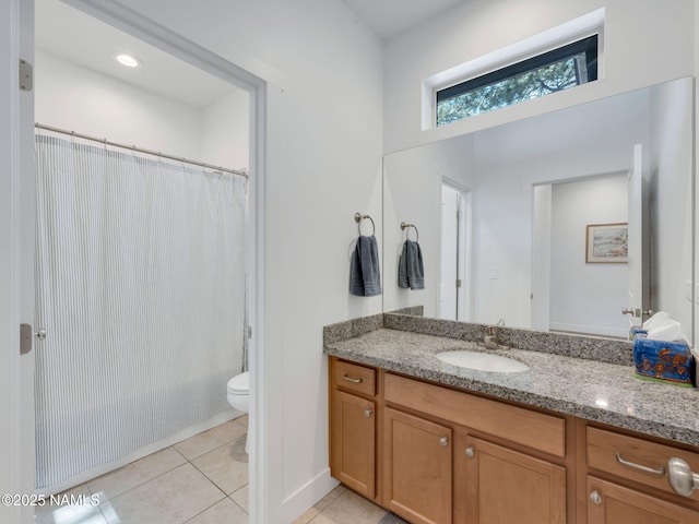 full bath with toilet, a shower with curtain, vanity, and tile patterned floors