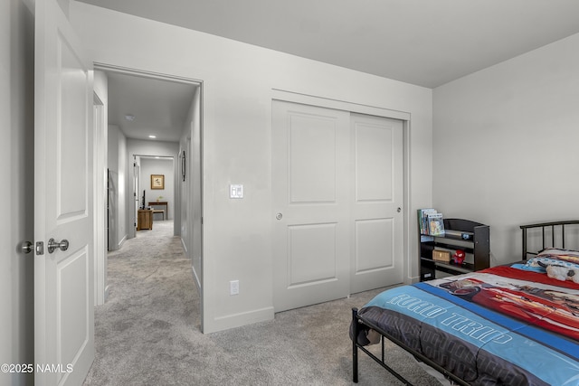 12296 Curtis Ct, Bellemont, AZ 86015 - carpeted bedroom featuring a closet and baseboards