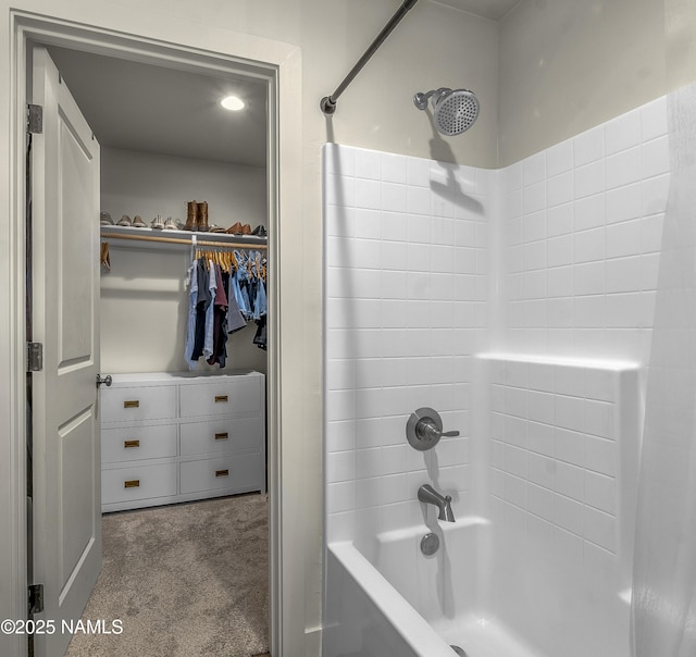 12296 Curtis Ct, Bellemont, AZ 86015 - bathroom with tub / shower combination and a walk in closet
