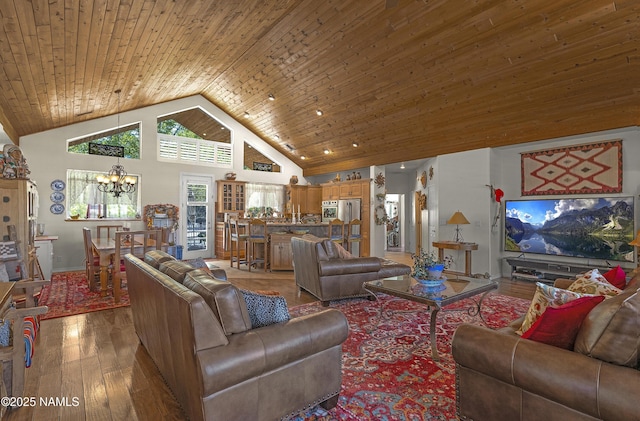 11267 N Lilac Ln, Flagstaff, AZ 86004 - living room with a chandelier, hardwood / wood-style floors, high vaulted ceiling, wood ceiling, and baseboards