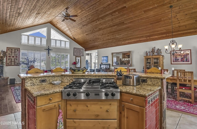 11267 N Lilac Ln, Flagstaff, AZ 86004 - kitchen featuring stainless steel gas cooktop, open floor plan, a chandelier, wood ceiling, and high vaulted ceiling