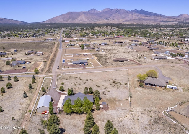 11267 N Lilac Ln, Flagstaff, AZ 86004 - aerial view of property and surrounding area featuring mountains, a desert landscape, and rural landscape
