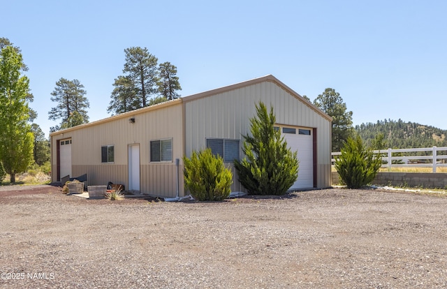 11267 N Lilac Ln, Flagstaff, AZ 86004 - view of property exterior with a detached garage