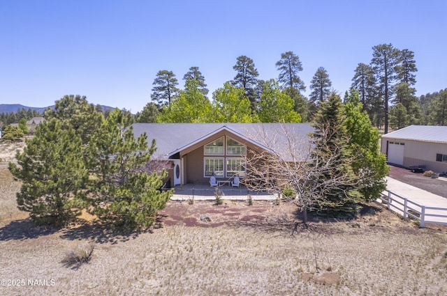 11267 N Lilac Ln, Flagstaff, AZ 86004 - view of front of home featuring a garage and concrete driveway