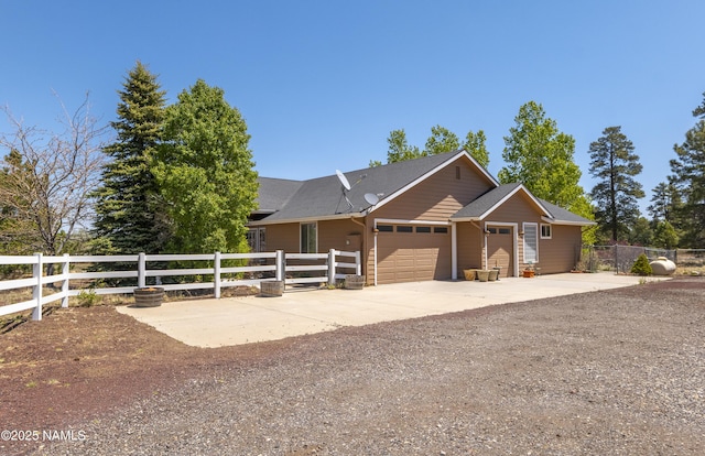 11267 N Lilac Ln, Flagstaff, AZ 86004 - ranch-style home featuring a garage and concrete driveway