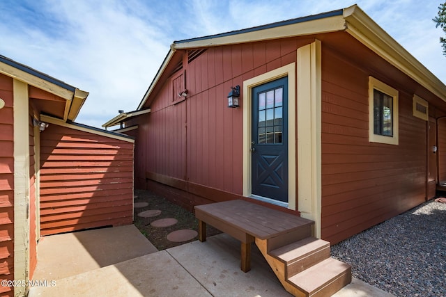 6600 W Suzette Ln, Flagstaff, AZ 86001 - view of exterior entry with a patio