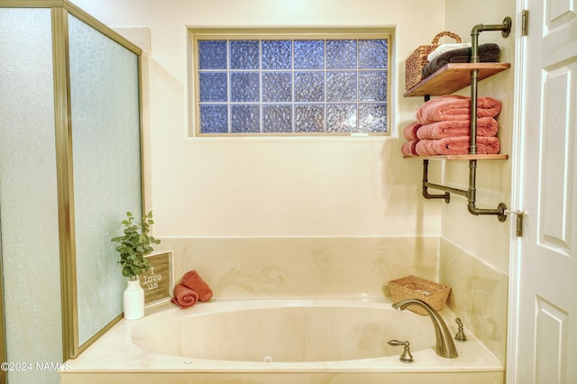 bathroom with a washtub