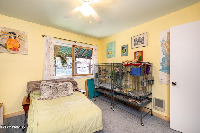 bedroom with visible vents, a ceiling fan, baseboards, and carpet floors