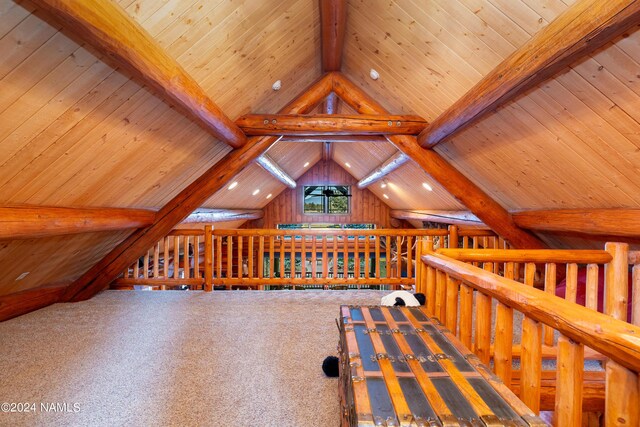 additional living space featuring vaulted ceiling with beams, carpet, and wood ceiling