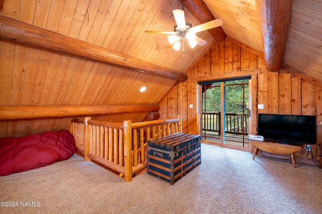 carpeted bedroom with wooden ceiling, wooden walls, high vaulted ceiling, beam ceiling, and access to exterior