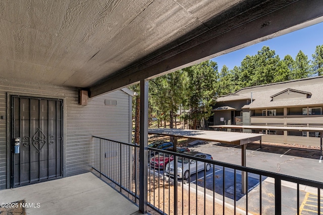 view of patio with a balcony