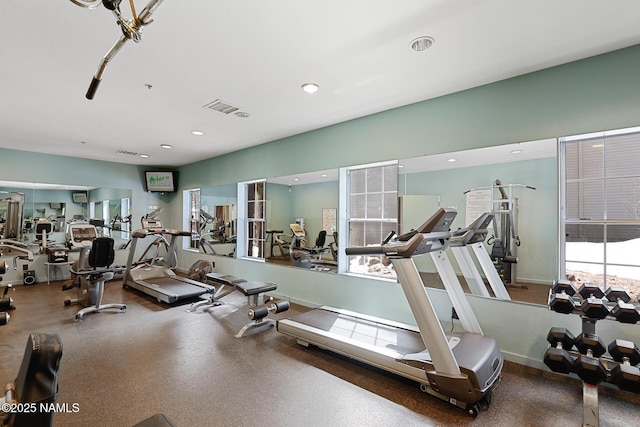 workout area with recessed lighting