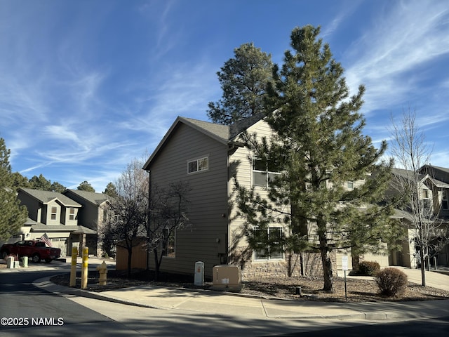 view of home's exterior with a garage