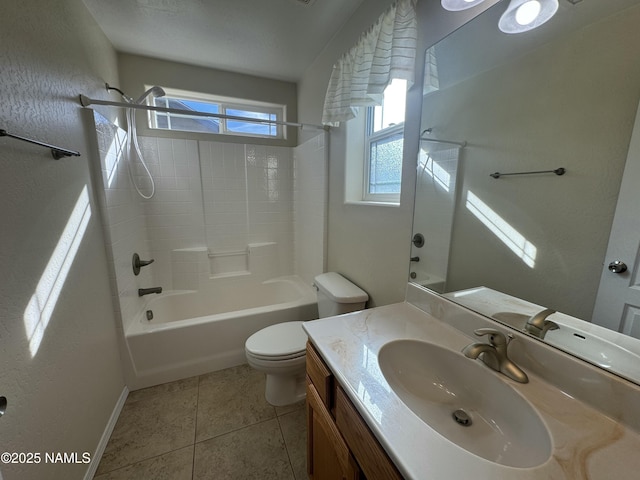 full bathroom with tile patterned flooring, vanity, bathing tub / shower combination, and toilet