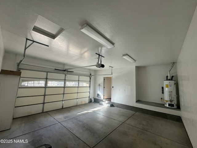 garage with a garage door opener and gas water heater