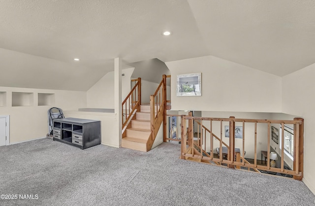 8841 E Rolling Thunder Dr, Flagstaff, AZ 86004 - bonus room featuring vaulted ceiling, carpet floors, stairs, and recessed lighting