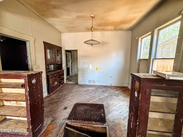 216 W 3rd St, Winslow, AZ 86047 - unfurnished dining area featuring wood finished floors