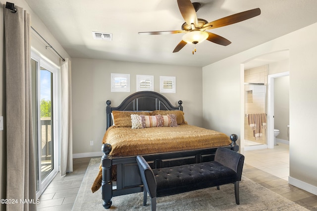 bedroom with connected bathroom, ceiling fan, and access to outside