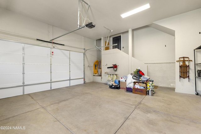 garage featuring a garage door opener