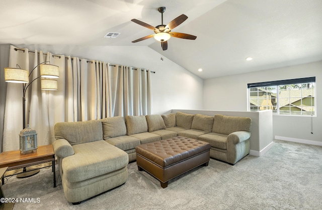 living room with ceiling fan, carpet flooring, and lofted ceiling