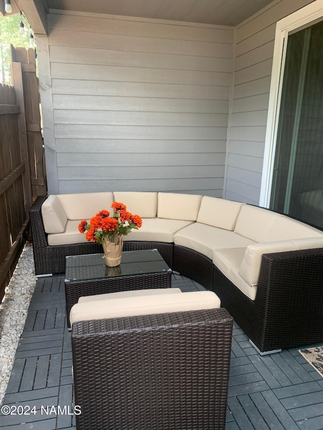 deck with an outdoor hangout area