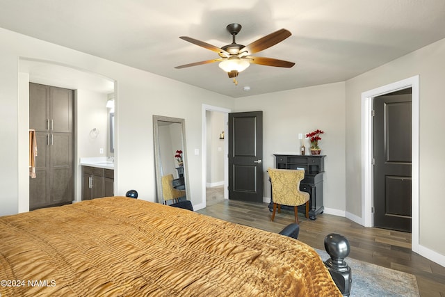 bedroom with ceiling fan and connected bathroom