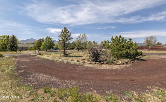 9835 Pioneer Valley Rd, Flagstaff, AZ 86004 - view of dirt / gravel road with a mountain view