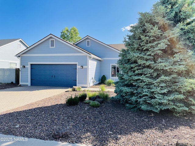 11677 W Cove Crest Dr, Bellemont, AZ 86015 - view of front of house with a garage and driveway