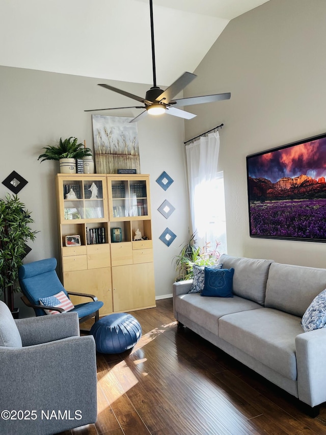 11677 W Cove Crest Dr, Bellemont, AZ 86015 - living area with dark wood-style floors, a ceiling fan, and vaulted ceiling