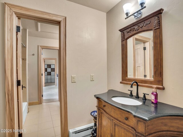 284 E Foothill Trl, Williams, AZ 86046 - bathroom with vanity, tile patterned flooring, and a baseboard radiator