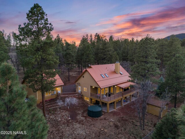 284 E Foothill Trl, Williams, AZ 86046 - birds eye view of property with a wooded view