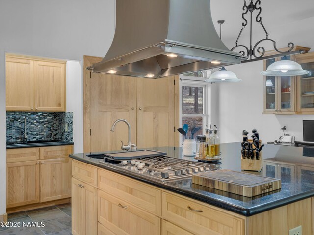 284 E Foothill Trl, Williams, AZ 86046 - kitchen with light brown cabinets, island exhaust hood, a sink, backsplash, and stainless steel gas stovetop