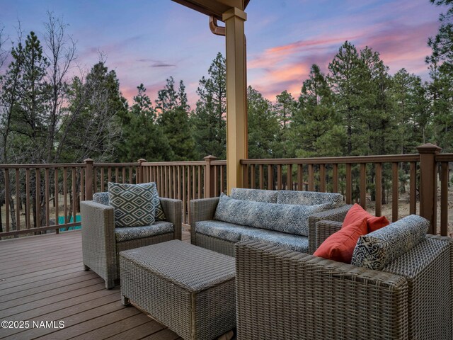 284 E Foothill Trl, Williams, AZ 86046 - deck at dusk featuring an outdoor living space