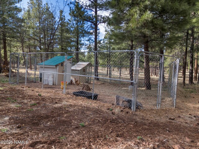 284 E Foothill Trl, Williams, AZ 86046 - view of yard with exterior structure and an outbuilding
