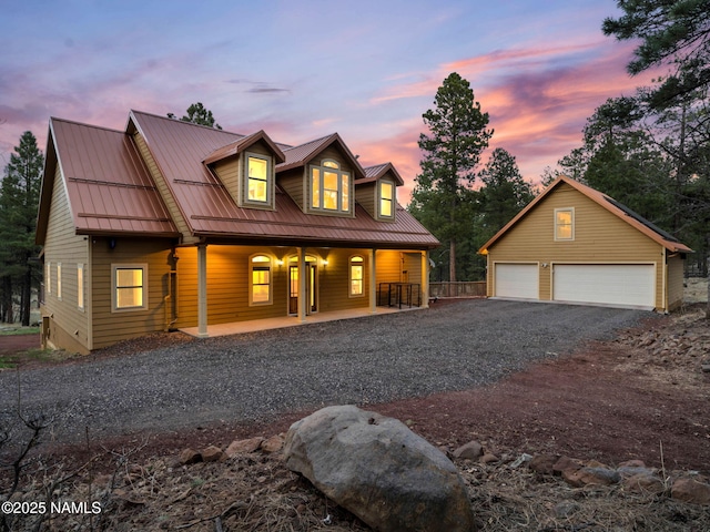 284 E Foothill Trl, Williams, AZ 86046 - rustic home featuring covered porch, an outdoor structure, and a detached garage
