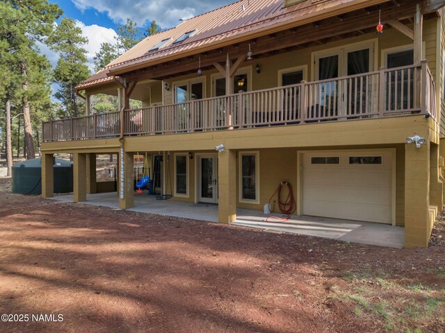 284 E Foothill Trl, Williams, AZ 86046 - back of property with a garage and metal roof