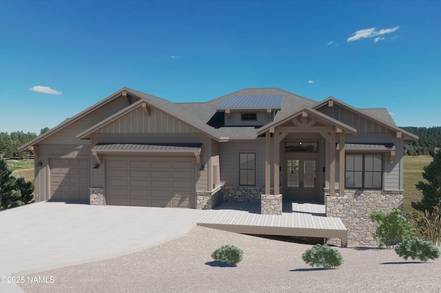 4965 W Braided Rein, Flagstaff, AZ 86005 - view of front of property with stone siding, board and batten siding, french doors, and a garage