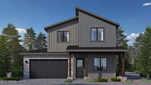 3229 W Virgo Dr Lot 8, Flagstaff, AZ 86001 - modern home featuring board and batten siding, decorative driveway, a standing seam roof, metal roof, and a garage