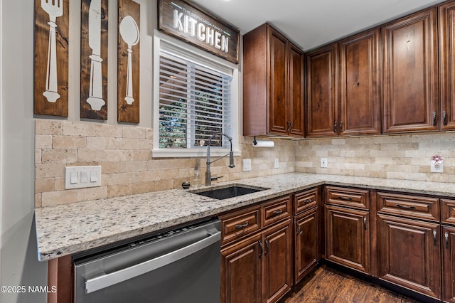3425 W Mountain Dr, Flagstaff, AZ 86001 - kitchen with dishwasher, backsplash, dark wood-type flooring, light stone counters, and dark brown cabinets