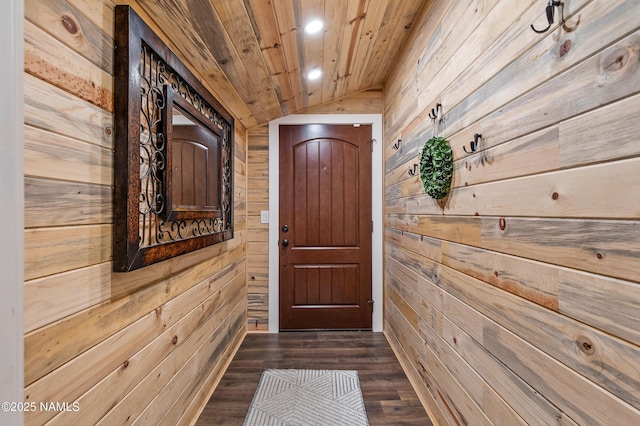 3425 W Mountain Dr, Flagstaff, AZ 86001 - doorway to outside featuring wood walls, vaulted ceiling, wooden ceiling, recessed lighting, and dark wood-style flooring