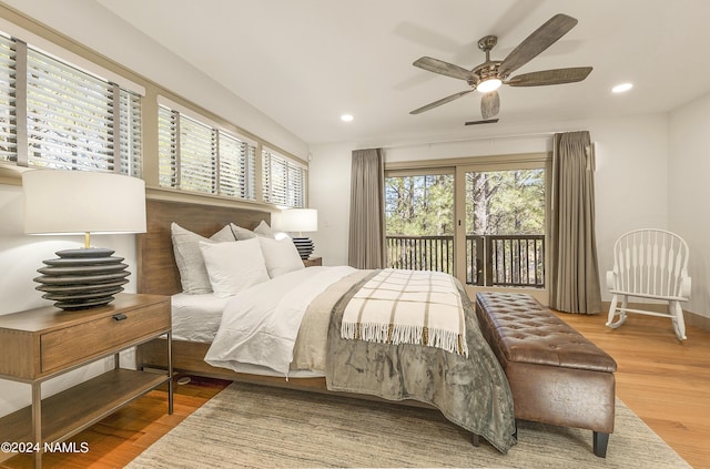 bedroom with ceiling fan, access to exterior, and hardwood / wood-style flooring