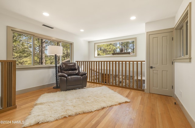 sitting room featuring light wood-type flooring