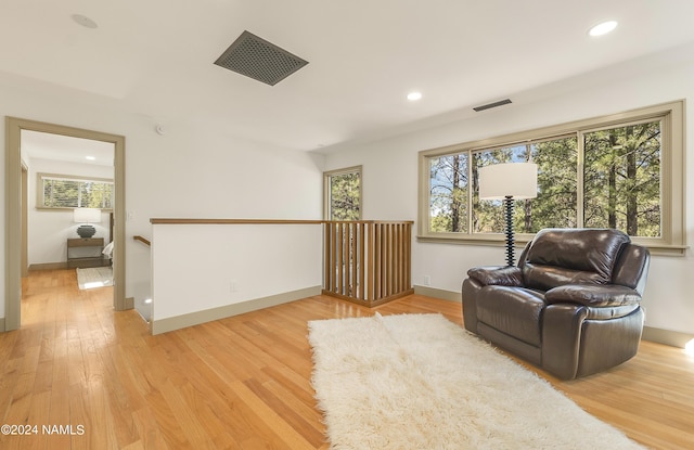 living area featuring light hardwood / wood-style flooring