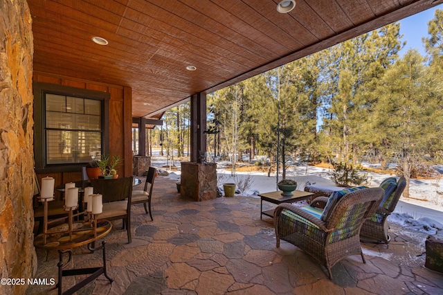 view of snow covered patio