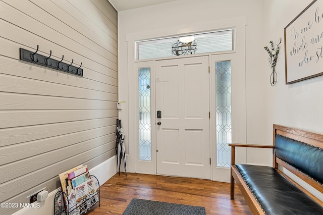 3380 E Lockett Rd, Flagstaff, AZ 86004 - entrance foyer with wooden walls, wood finished floors, and plenty of natural light