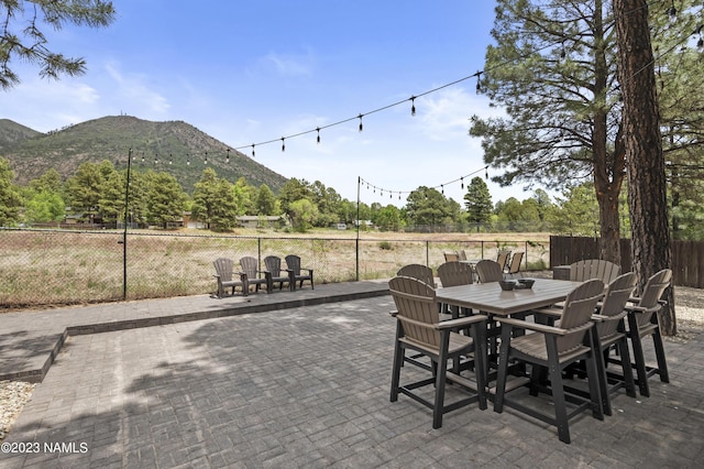 3380 E Lockett Rd, Flagstaff, AZ 86004 - view of patio featuring a mountain view and outdoor dining area
