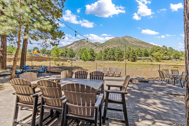 3380 E Lockett Rd, Flagstaff, AZ 86004 - view of patio / terrace featuring outdoor dining area and a mountain view
