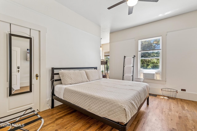 3380 E Lockett Rd, Flagstaff, AZ 86004 - bedroom with wood finished floors, cooling unit, and ceiling fan